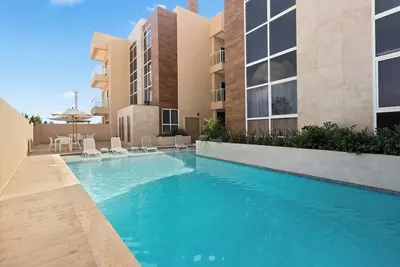 Image de Spacious 2br Palm Beach Condo with Pool Access at Aracari 8 by Bocobay