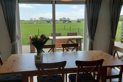 De Zeevonk, a wheelchair friendly apartment with a beautiful restfull view
