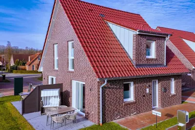 Image de Ferienhaushälfte Wasserseite - Küsten Apartments Tannenhausen