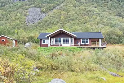Image de Maison de vacances pour 6 a Laukvik-By Traum