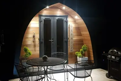 Image de Oriental Garden Pod. Set in our gorgeous garden of bonsai, pagoda and koi pond.