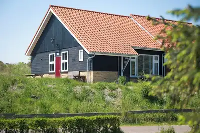 Image de Actief is a cozy house near the beach and \"Nessemerbos\".