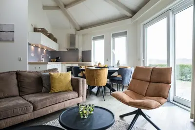 Image de Amie a nice holiday home near the golf course, the village of Hollum and nature.
