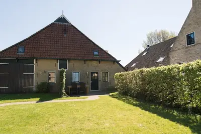Image de Nooitgedacht, a nice apartment on the corner of an Ameland farmhouse in Ballum.