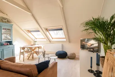 Image de Nice studio for 2 people in the centre of Nes and the beach is 1. 5 km away.