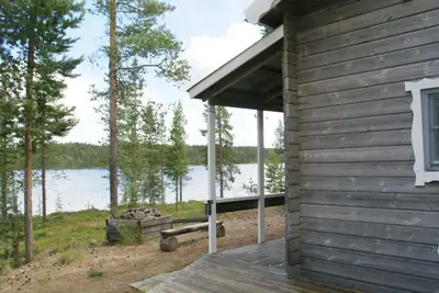 Image de Vacation in the blueberry forest by the lake with a boat