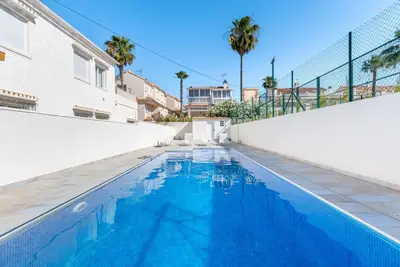 Image de Appartement 'Las Calas Jardín E' avec piscine partagée, terrasse privée et Wi-Fi
