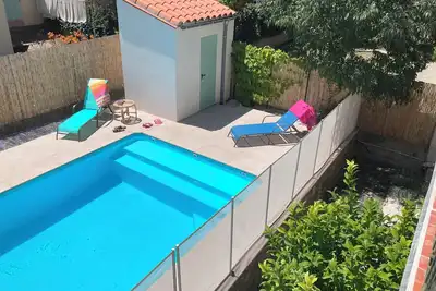 Image de Cinq minutes du centre ville, pool, bbq WiFi