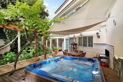 Image de Maison de vacances 'Carmelo Y Carmela 1' avec terrasse privée, jardin privé et Wi-Fi