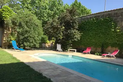 Image de Grande maison vigneronne avec piscine et jardin dans un joli village du Gard