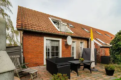 Image de Maison de vacances \"Huus Ant Kornfeld Rez-de-chaussée\" avec jardin commun et Wi-Fi