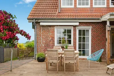 Image de Maison de vacances \"Huus ant Diek\" avec terrasse privée et Wi-Fi