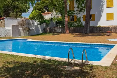 Image de Superbe Appartement à Palamós: 3 Chambres, Terrasse, Piscine, Parking et Proche Plage