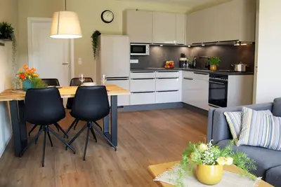 Image de Topsanierte Ferienwohnung mit Sauna, Terrasse u. Garten