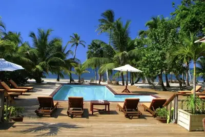 Image de Private Beachfront Bungalow- Perfect location! Gated community! Paradise Awaits!