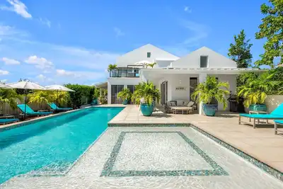 Image de Villa Xoxo is a modern 4-bedroom vacation villa in the Turks and Caicos Islands