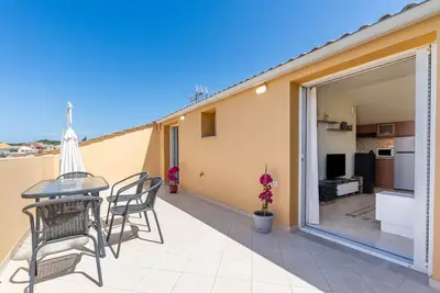 Image de Appartement \"Soffitta Bampina\" près de la plage avec balcon