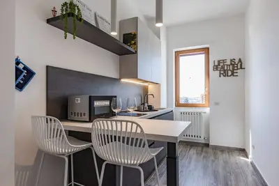 Image de Tonino Apartment a stone's throw from the station and downtown