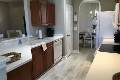 Image de Spacious Coach Home with garage in the beautiful Cape Harbour Community.