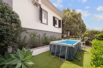 Image de Maison de vacances \"Villa Matteo Suite\" avec vue sur la mer, piscine partagée et Wi-Fi
