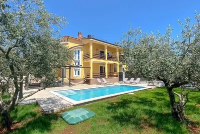Image de Maison de vacances pour 8 personnes env. 150 qmà Stancija Vinjeri Novigrad, Istrie (Istrische Riviera)