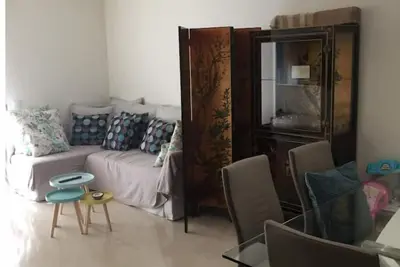 Image de Appartement Neuf 95m2 à 2 min à pied de la plage