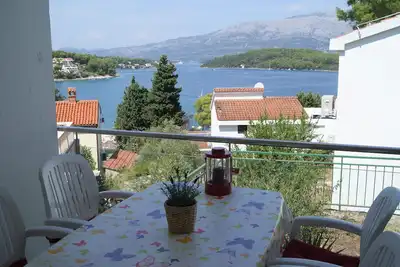 Image de A bright 1-bedroom apartment, w/terrace and separate seating area with sea view