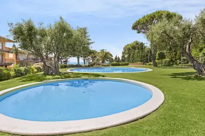 Image de 1i -90 Appartement confortable avec piscine commune à quelques minutes à pied de la plage de Calella de Palafrugell