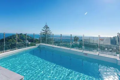 Image de A rare brand new apartment is in the heart of one of the most beautiful villages in  Mijas Pueblo. Modern open plan design with luxury furnishing and details that will make your holiday unique. The seasonal  pool is closed from December to April