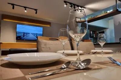 Image de Triplex Guarujá Enseada 3 suites 4 spaces for up to 13 people (8)