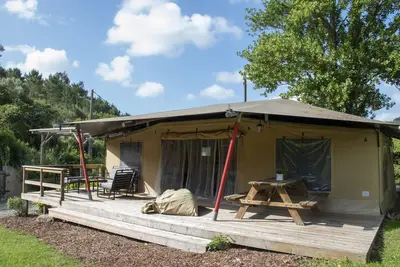 Image de Bedouine style glamping lodge in mini resort.