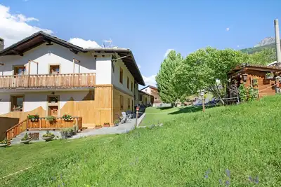 Image de Appartement \"Maison Grange 4\" avec vue sur la montagne, jardin partagé et Wi-Fi