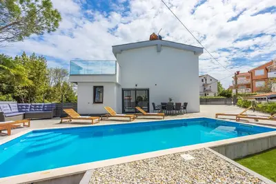 Image de Maison de vacances Malinska pour 2 - 6 personnes avec 3 chambres à coucher - Maison de vacances