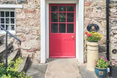 Image de This charming property is located in a former Granary which once served the local village.