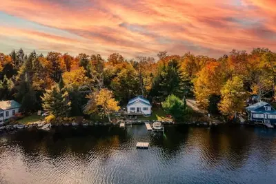 Image de True lakefront living on Boyd Lake, Maine. Luxury on the lake for all to enjoy.