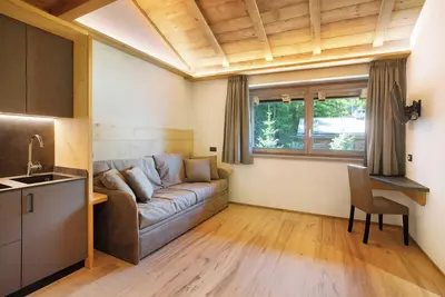 Image de Appartement 'Agriturismo Bosco D'oro 2' avec vue sur les montagnes, jardin partagé et Wi-Fi