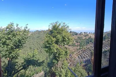 top of the mountain surrounding with nature view and snow caped mountains view f
