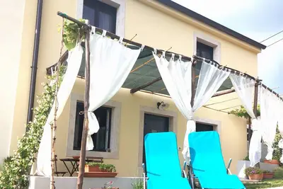 Image de Well house, 10 km from the sea, cozy house with a well in the living room