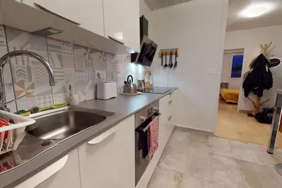 Image de Logement spacieux en face du musée