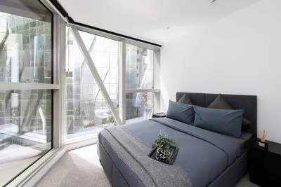 Image de A Cozy 2br Apt for 6 Next to Southern Cross
