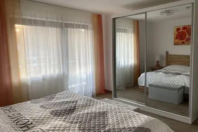 Image de Location-Confort-Salle de bain privée séparée-Vue sur le bois