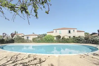 Image de Maison confortable, clim, jardin, piscine, stationnement privée