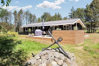 Image de Maison de vacances pour 6 a Strandby-By Traum