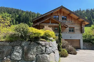 Image de Magnifique chalet en rondins 6/8 personnes avec Sauna à La Bresse - Garage