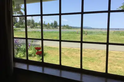 Image de Beachside bungalow with panoramic ocean views.