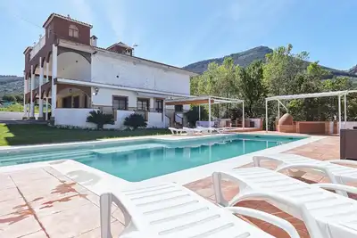 Image de Maison de vacances 'El Ranchito' avec vue sur les montagnes, piscine privée et Wi-Fi