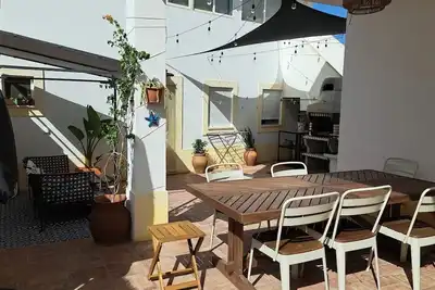 Image de Casa familiar confortável 5 min a pé da praia e centro!