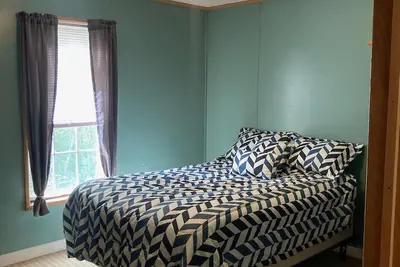 Image de Back to basics small simple cottage just a two minute drive to the beach.