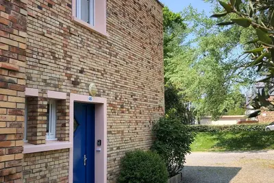 Duplex avec terrasse dans parc boisé à 500 m de la plage