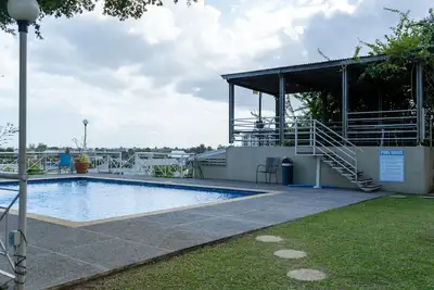 Image de Spacious townhouse with scenic view, swimming pool located in a gated community.